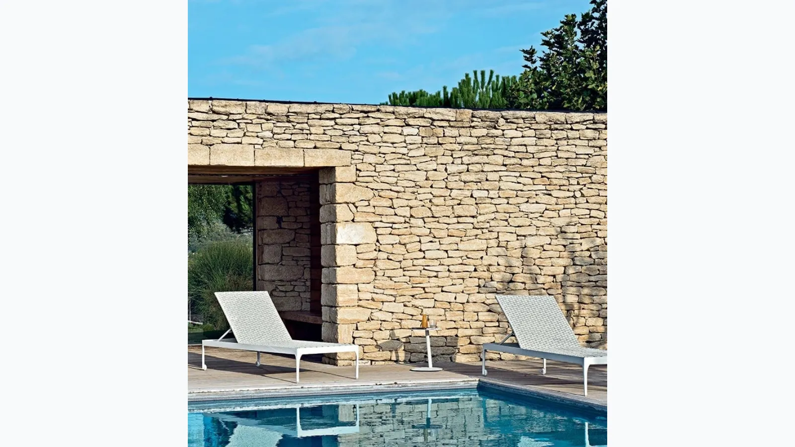 Infinity synthetic fiber sunbed by Ethimo.