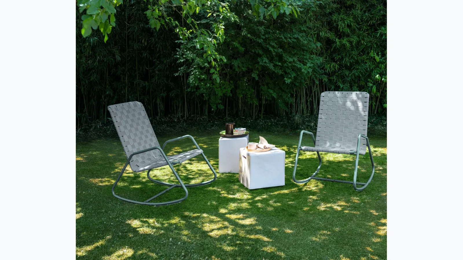 Inout rocking armchair in aluminum by Gervasoni.