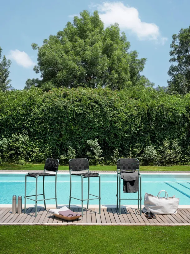Inout Stool in elastic strap and aluminum by Gervasoni.