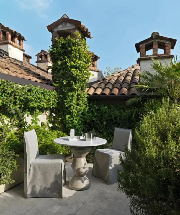 Inout coffee table in marble and cement by Gervasoni.