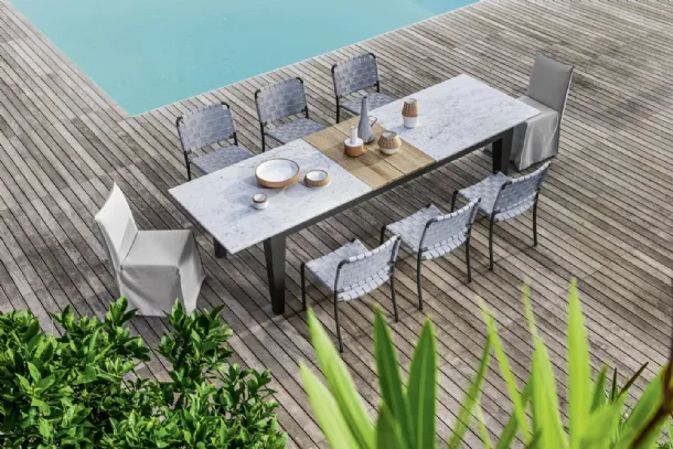 Extendable Inout table with marble top and teak by Gervasoni.