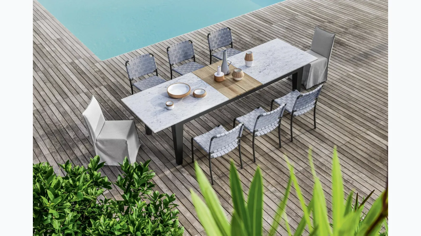Extendable Inout table with marble top and teak by Gervasoni.