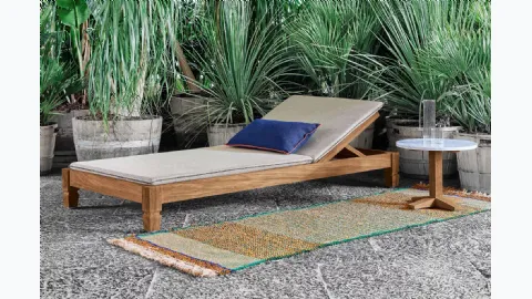 Jeko sun lounger in wood with Gervasoni fabric cushion.