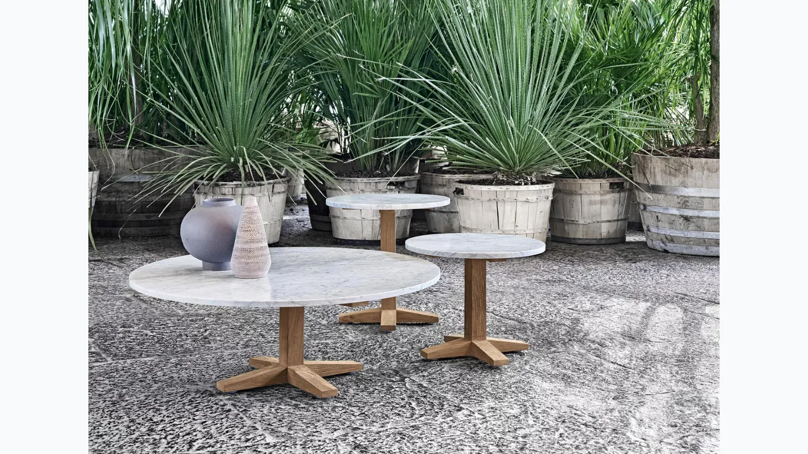 Jeko coffee table in marble and reclaimed teak by Gervasoni.