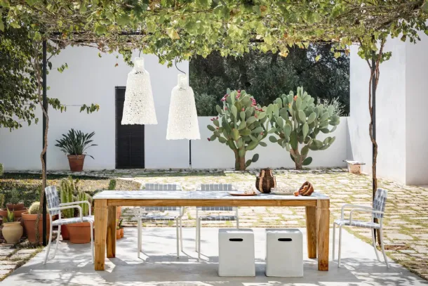 Jeko table in marble and reclaimed teak by Gervasoni.