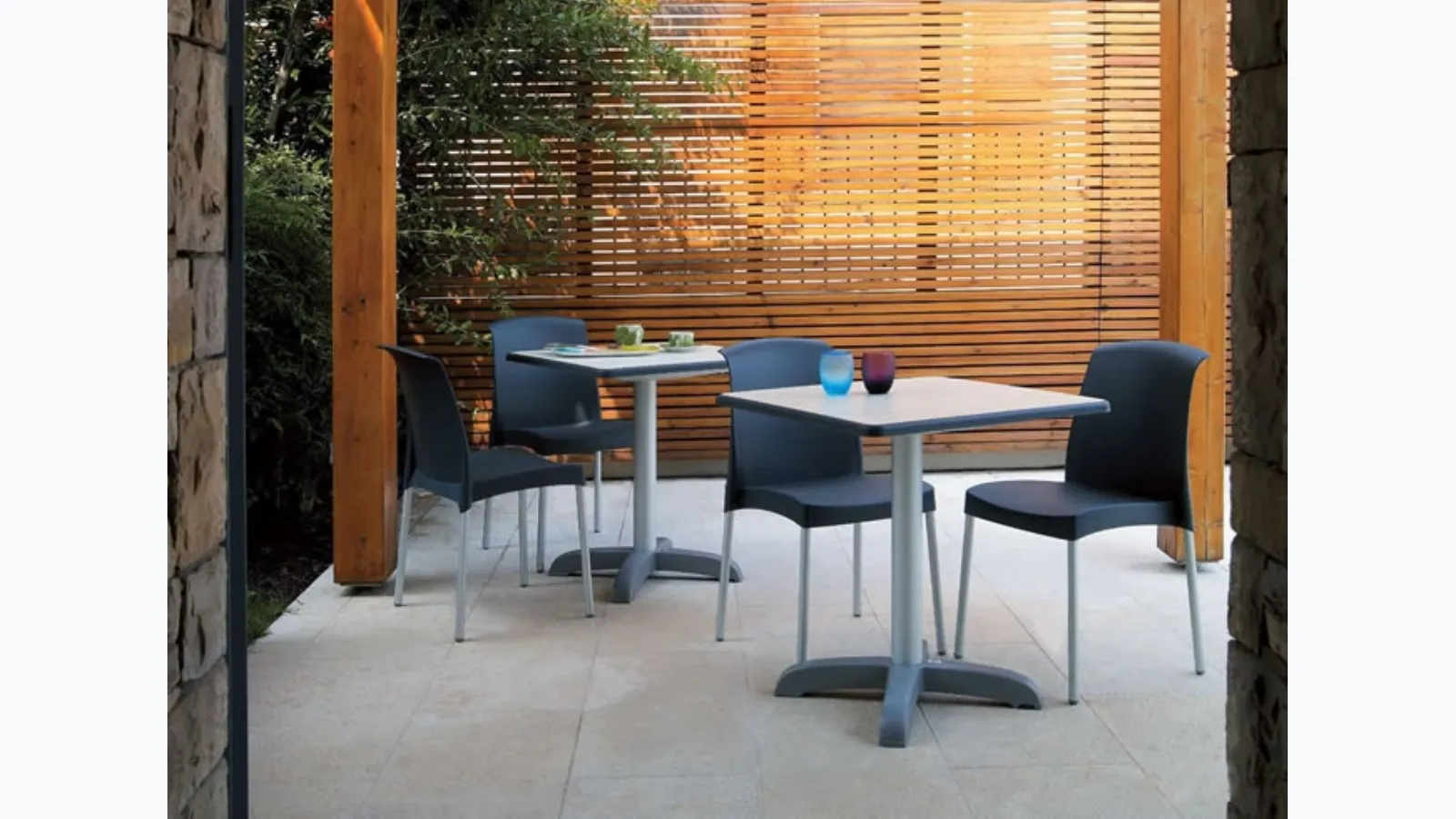 Stackable outdoor chair with aluminum legs, Jenny by Scab Design.