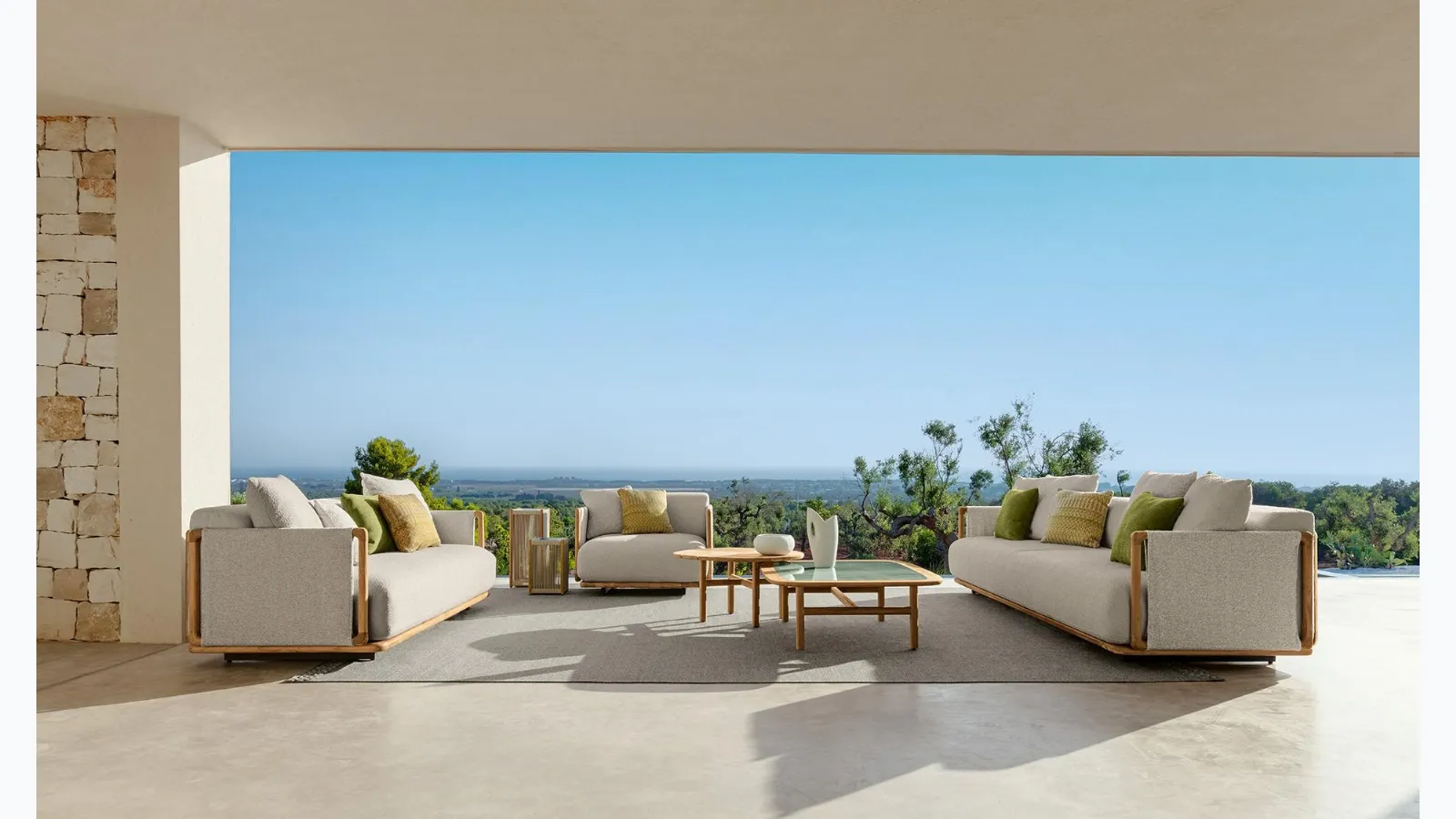 Jun outdoor furniture in wood and Talenti fabric.