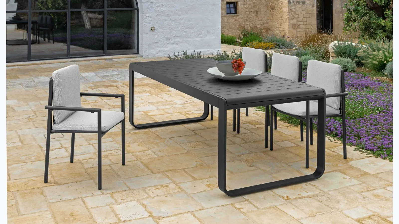 Table and Lake aluminum chairs by Talenti