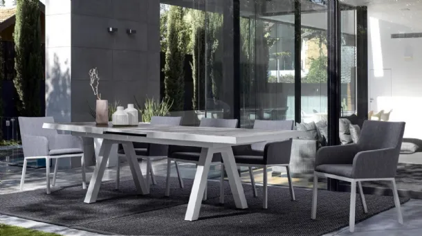Ceramic table and Lunar padded chairs by Bizzotto.