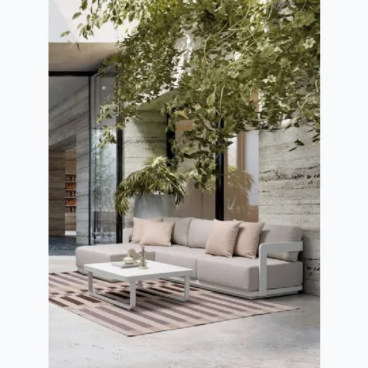 Sofa with peninsula and Mariel coffee table by Bizzotto.