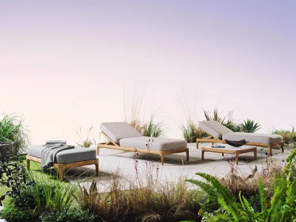 Sun lounger and Mediterranean wooden pouf with Gervasoni padded cushions.