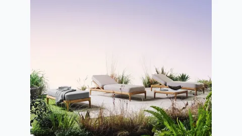 Sun lounger and Mediterranean wooden pouf with Gervasoni padded cushions.