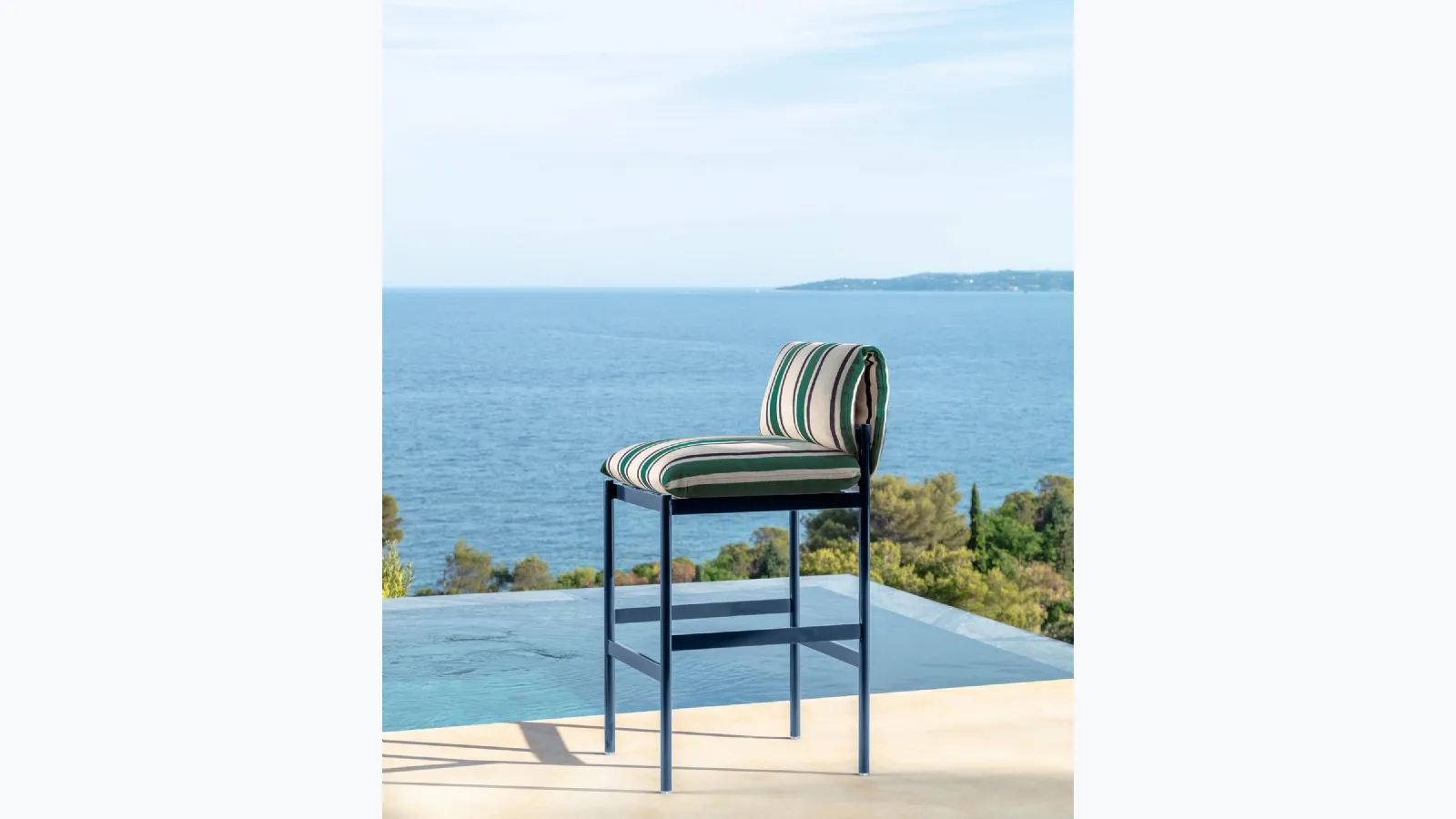 Nalu stool in padded fabric and metal by Talenti.