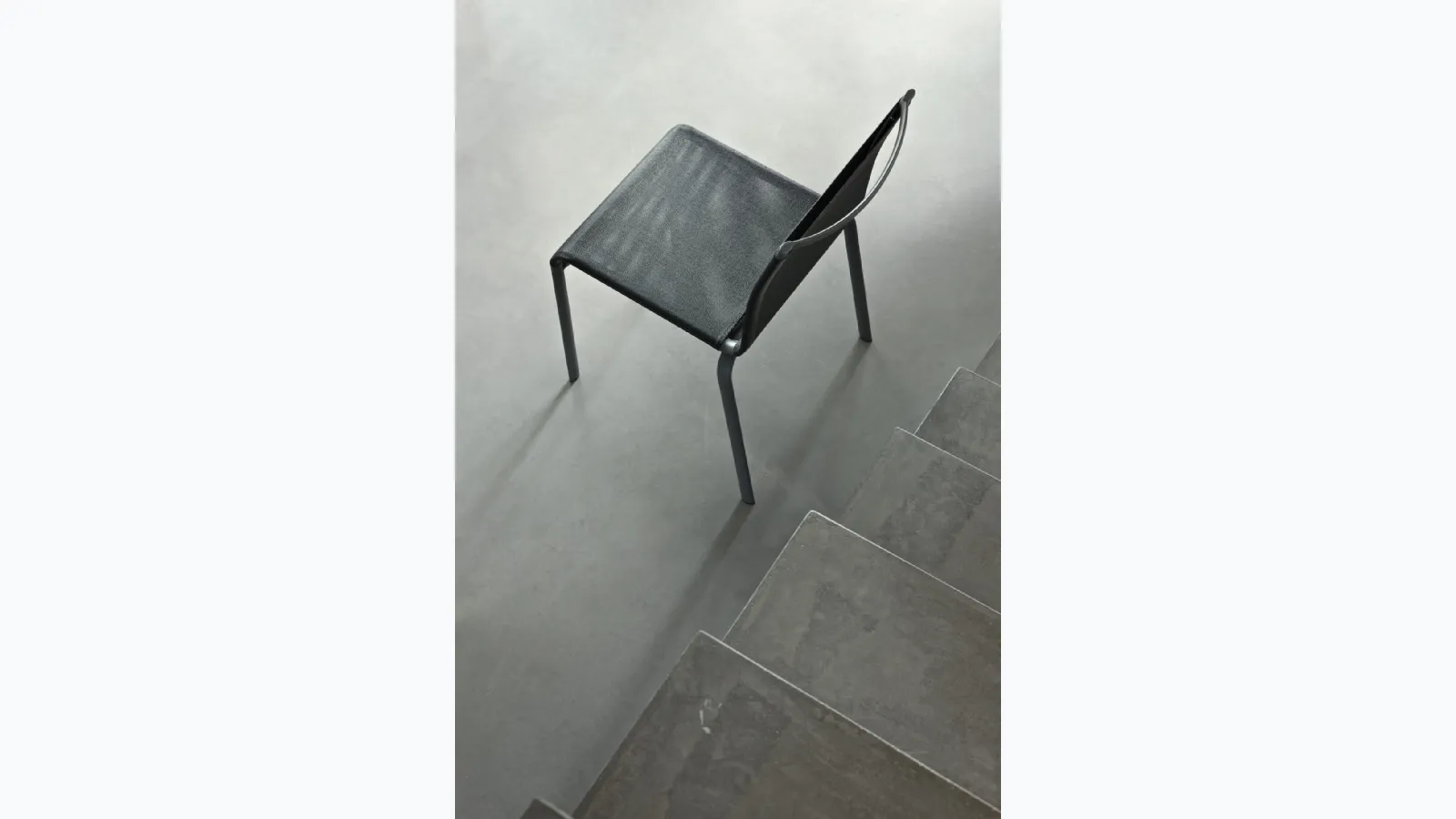 Stackable Net Outdoor garden chair with Texplast upholstery and lacquered steel structure by Bontempi.