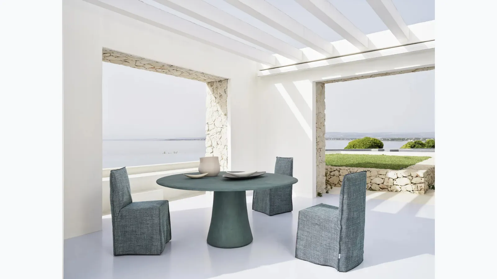 Noa table in spatulated resin by Gervasoni.