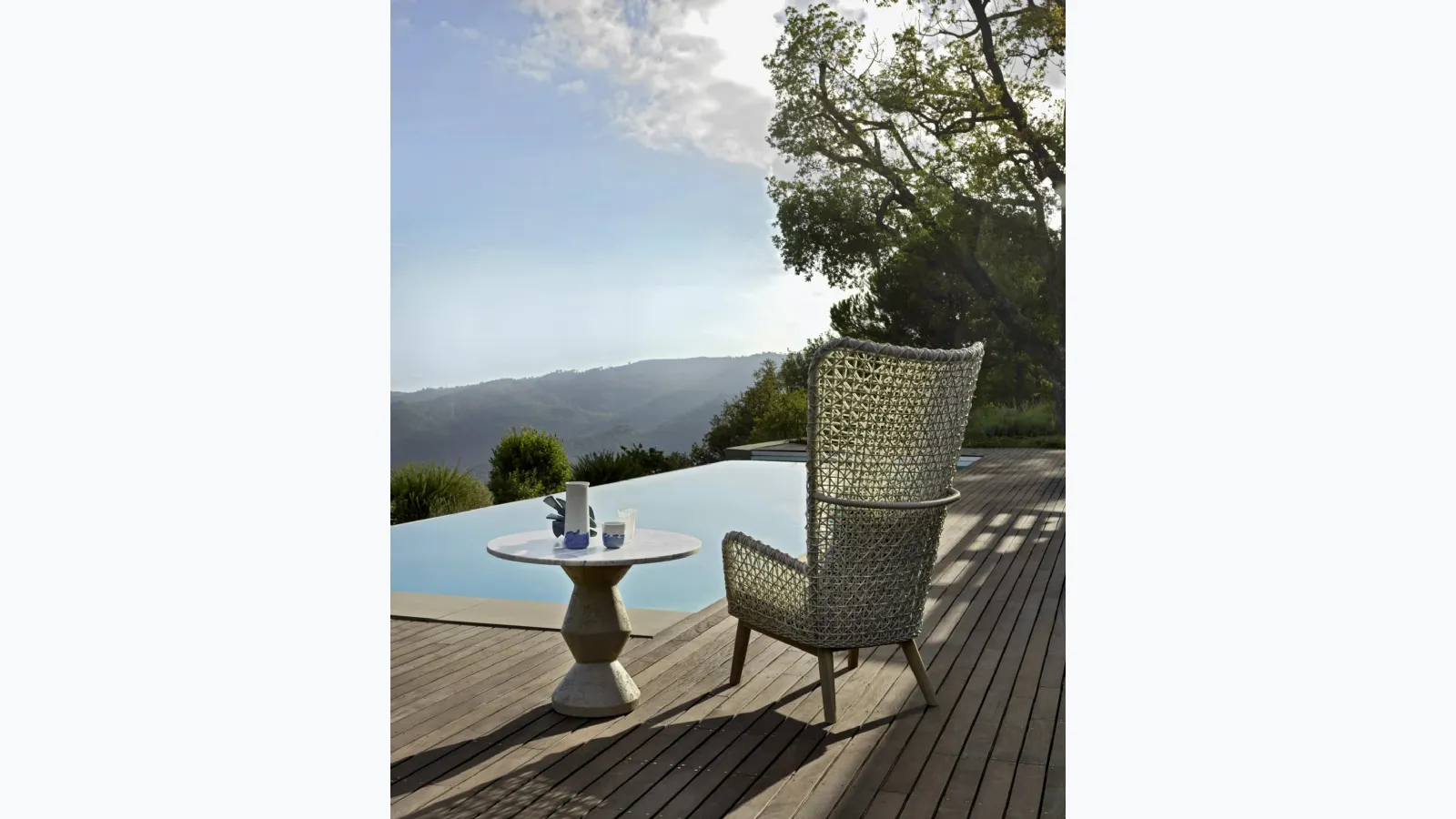 Bergere armchair Panda made with woven synthetic polyethylene fiber by Gervasoni.