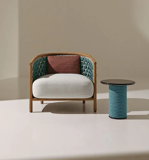 Patio coffee table in lava stone by Ethimo.