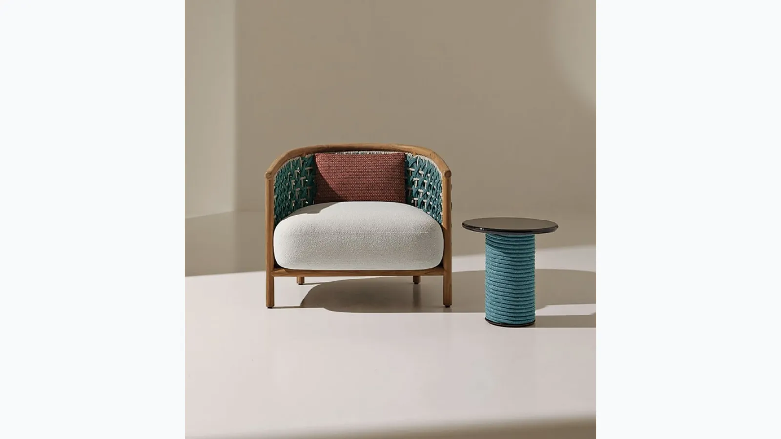 Patio coffee table in lava stone by Ethimo.