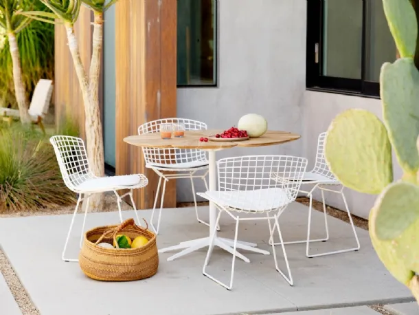 Petal® Dining Table in teak by Knoll