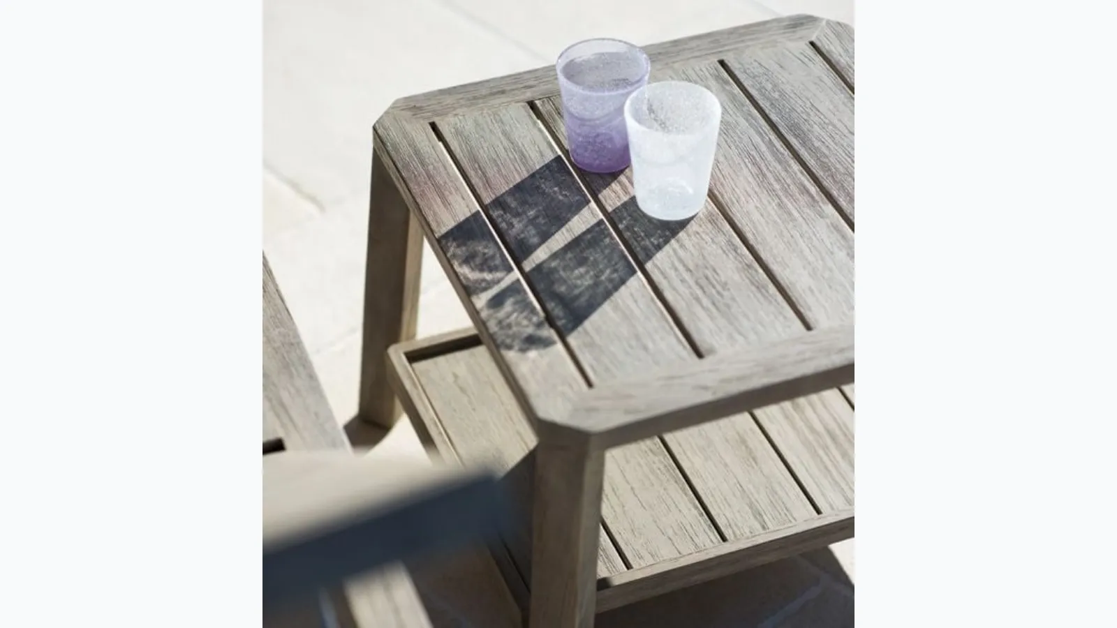 Small Petit Club table in teak by Ethimo.