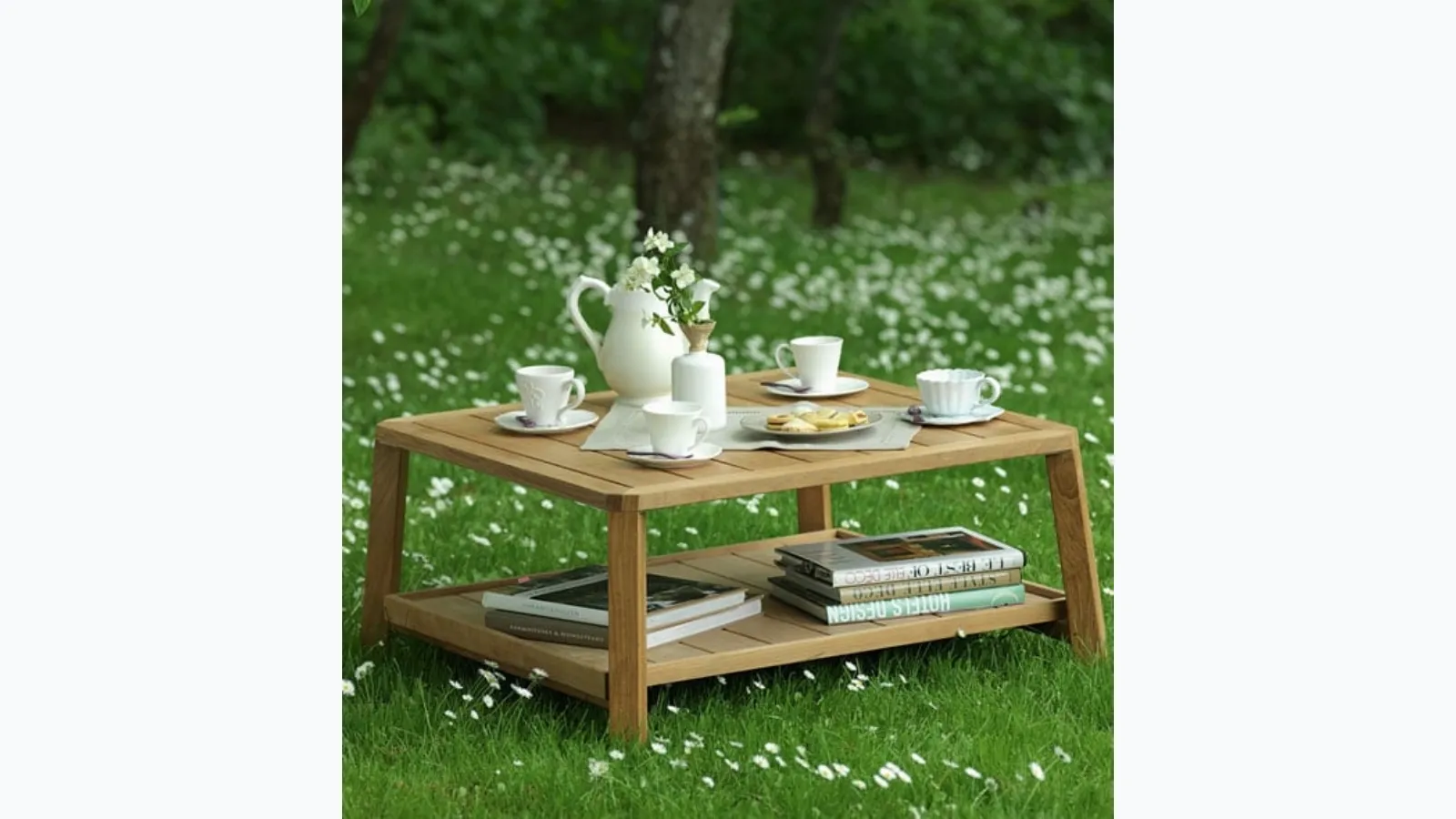 Small Petit Club coffee table in teak by Ethimo
