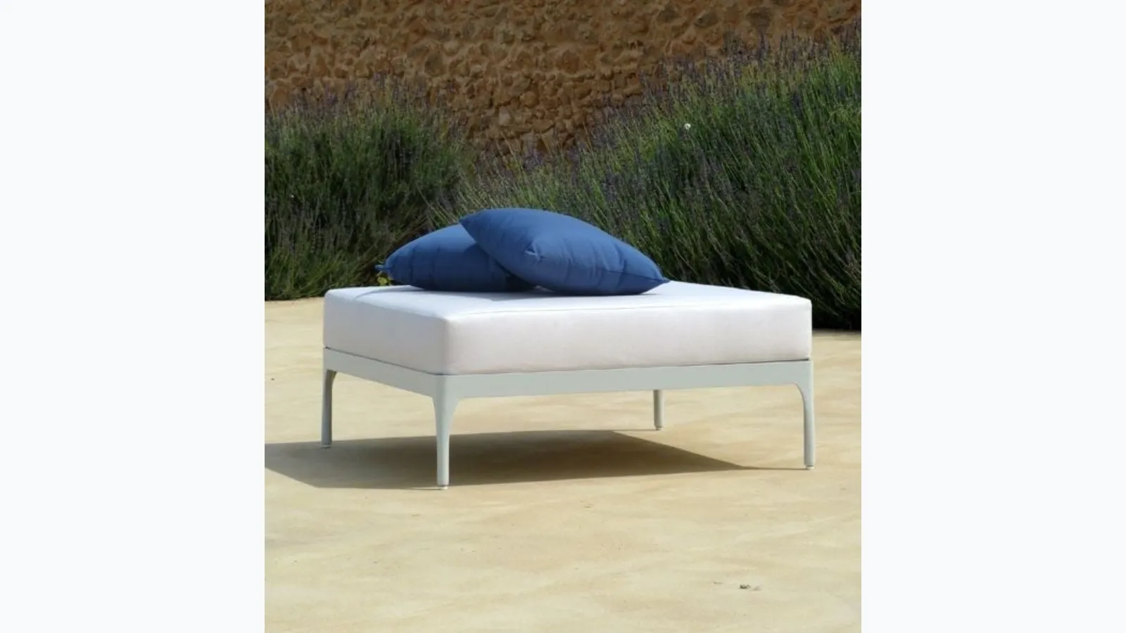 Infinity fabric and aluminum pouf by Ethimo.