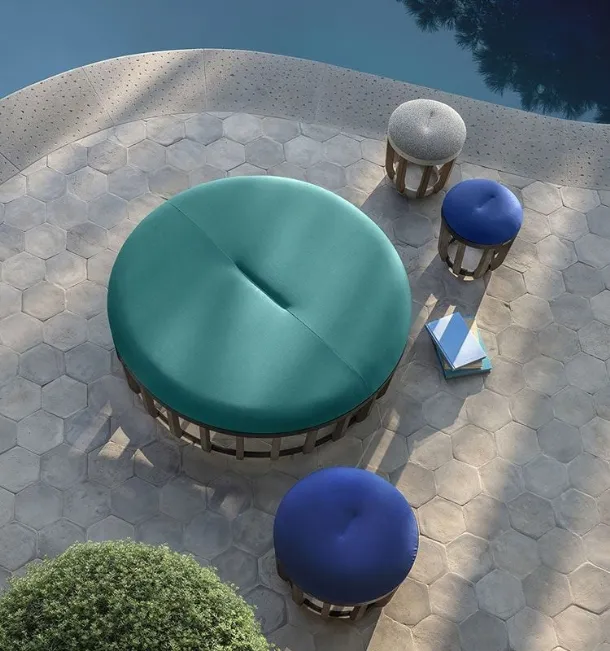 Swing fabric pouf with aluminum base by Ethimo.