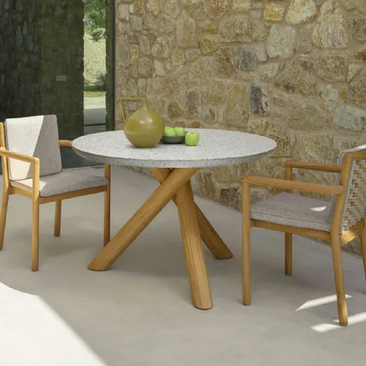 Terrazzo table in terrazzo and wood with wooden chairs and Talenti Prichi fabric.