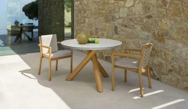 Terrazzo table in terrazzo and wood with wooden chairs and Talenti Prichi fabric.