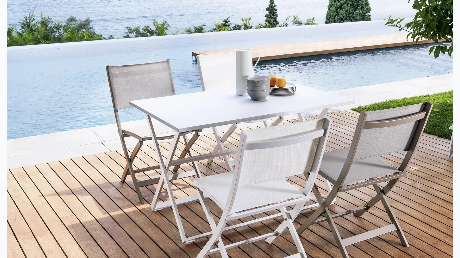 Aluminum chair and textilene with aluminum Queen table by Talenti.