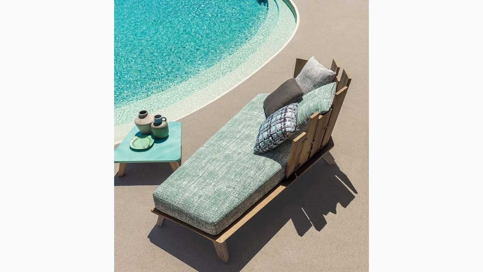 Rafael teak and fabric sofa with Ethimo coffee table