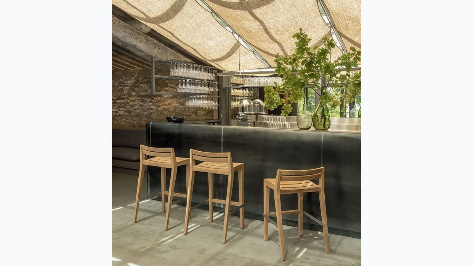 Ribot stool in teak by Ethimo.