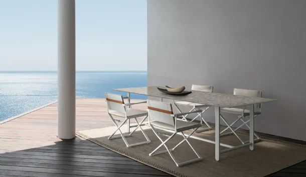 Ceramic table with Riviera fabric chairs by Talenti