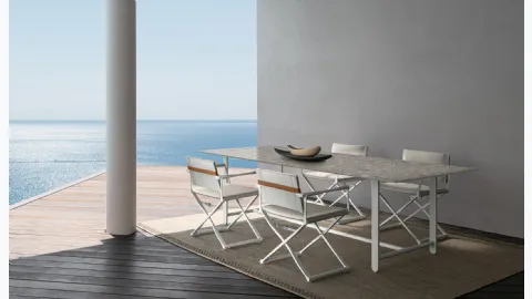 Ceramic table with Riviera fabric chairs by Talenti