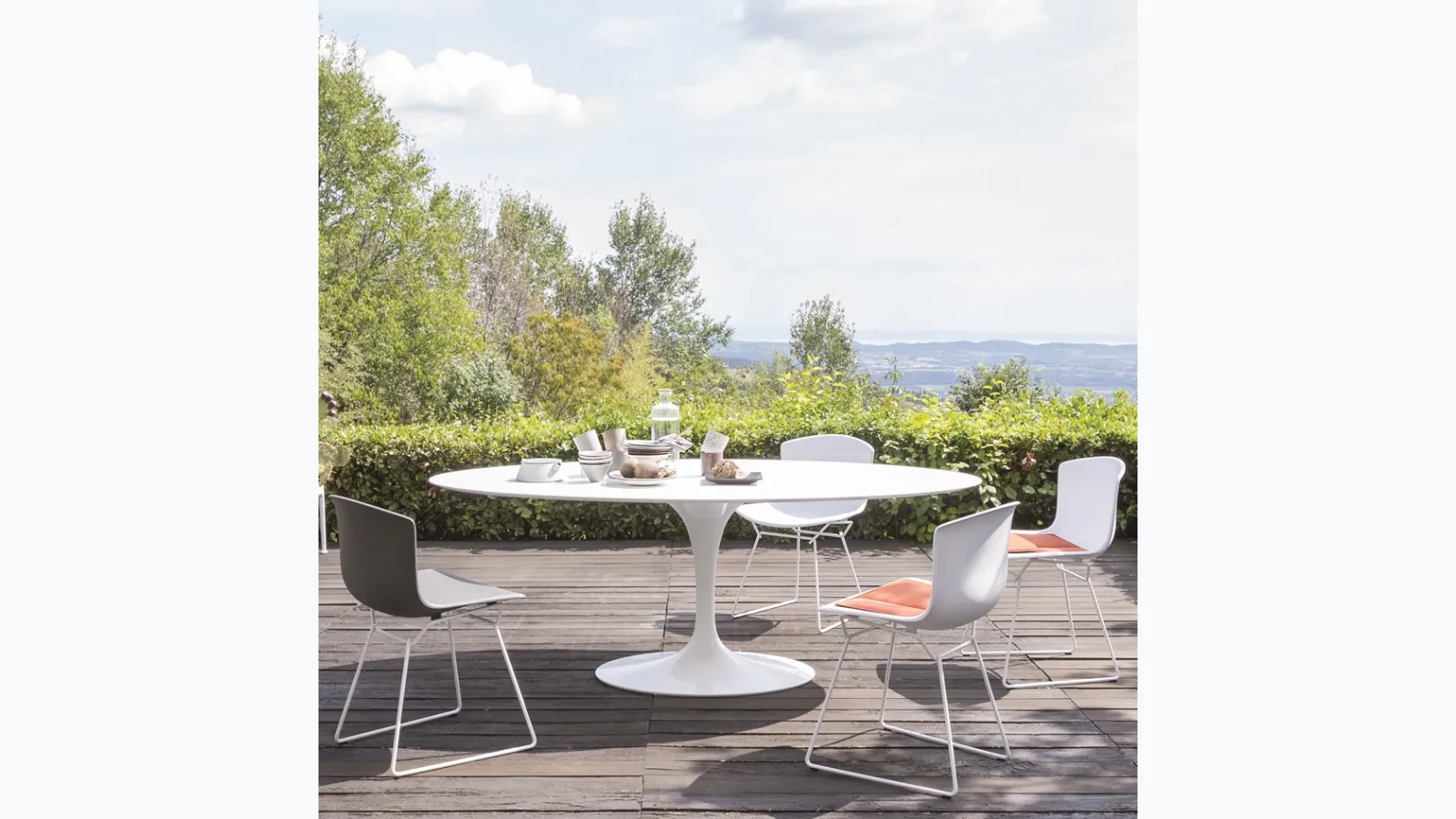 Saarinen Outdoor Dining Table by Knoll, made from synthetic stone