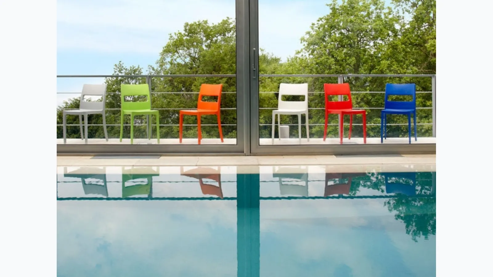 Garden chair in reinforced technopolymer with fiberglass available in various colors by Scab Design.