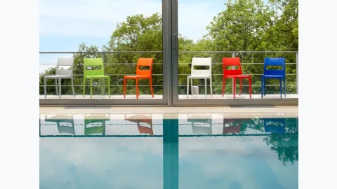 Garden chair in reinforced technopolymer with fiberglass available in various colors by Scab Design.