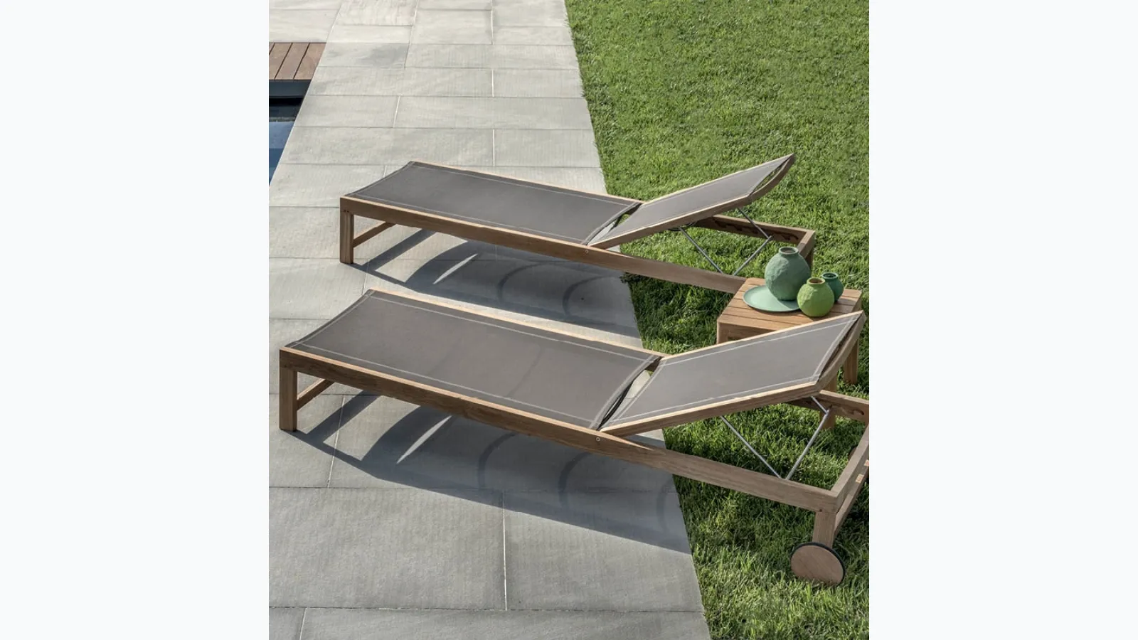 Teak Sand Lounger with Ethimo Cover.