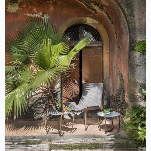 Sling Coffee Table with cement top by Ethimo.