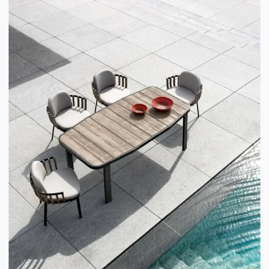 Swing armchair in teak and aluminum by Ethimo.