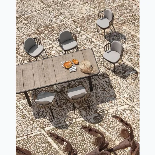 Swing table in teak and aluminum by Ethimo