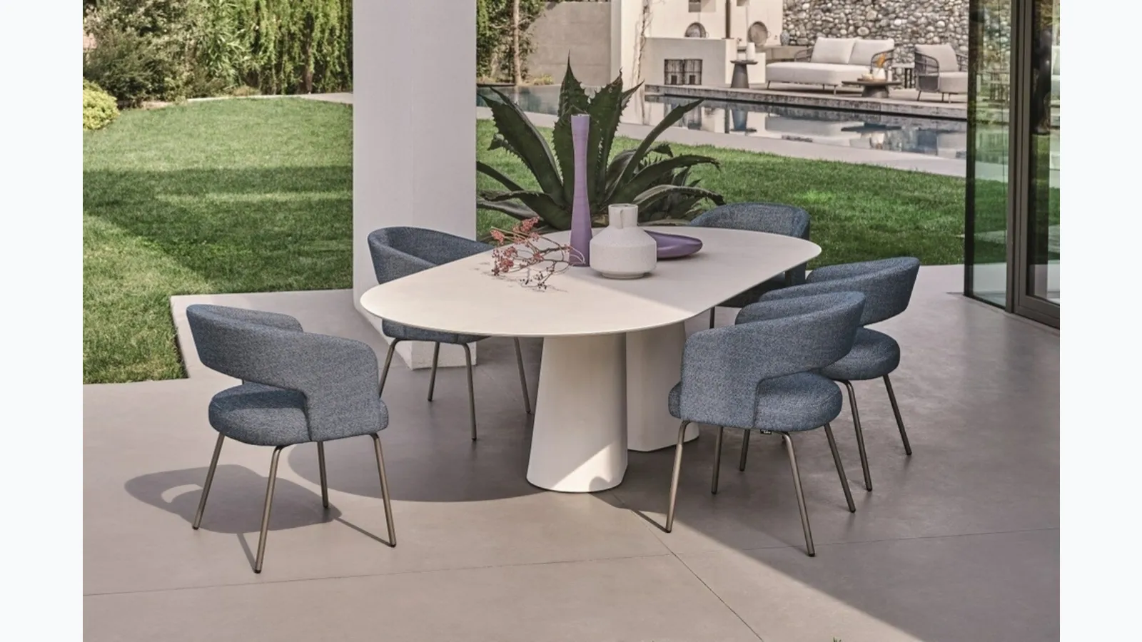 Pillar table with stoneware top and concrete base by Ditre Italia.