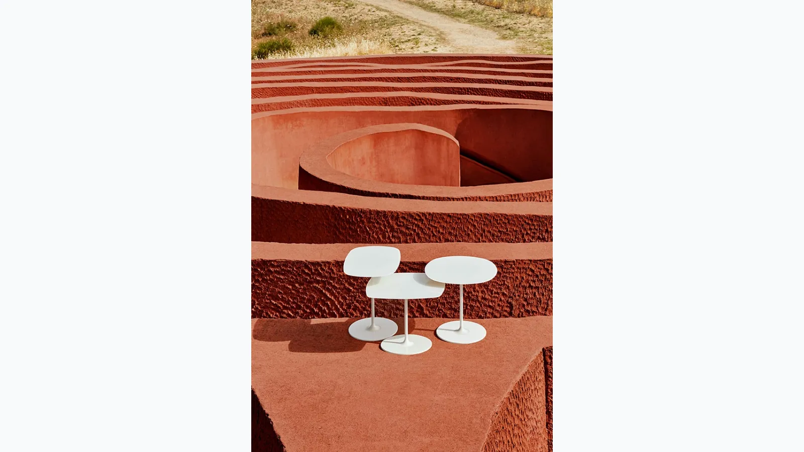 Thierry glass and metal side tables by Kartell.