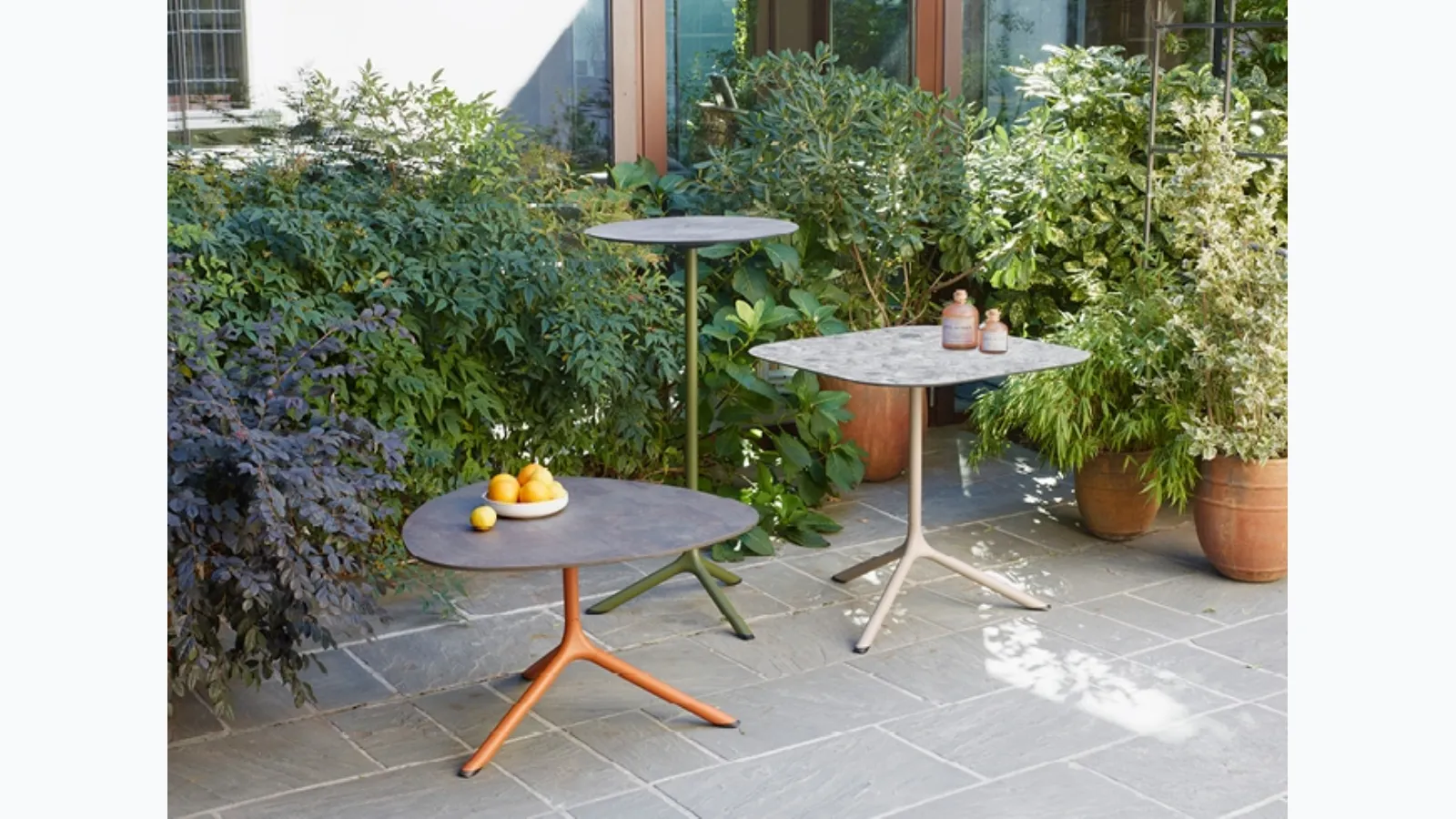 Tripod coffee tables by Scab Design.