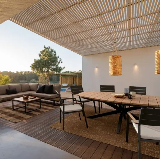 Table and Zelmar chairs in aluminum by Bizzotto.