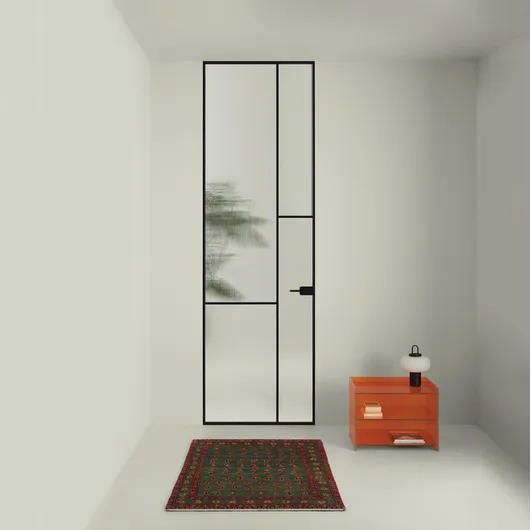 Interior flush wall door Sherazade Swing Plain Patchwork in glass with aluminum frame by Glas Italia.