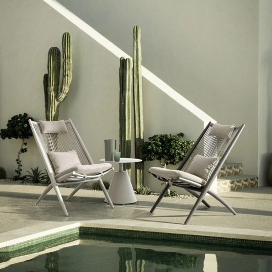 Aloha armchair and table in fabric and aluminum by Bizzotto.