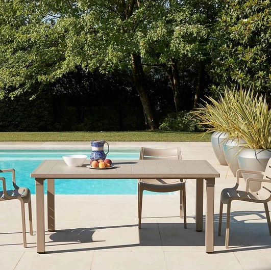 Technopolymer table with slatted effect top Ercole by Scab Design.