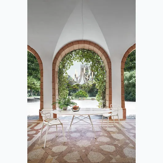 Glossy table in ceramic and steel by Kartell.