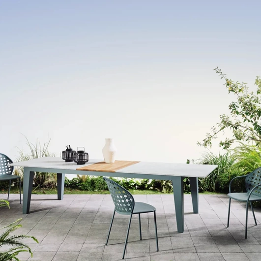 Extendable Inout table with marble top and teak by Gervasoni.